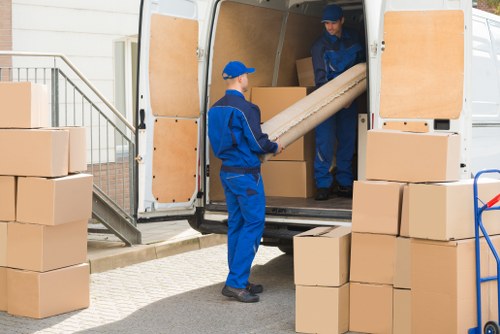 Warehouse team reviewing ethical supply chain compliance documents