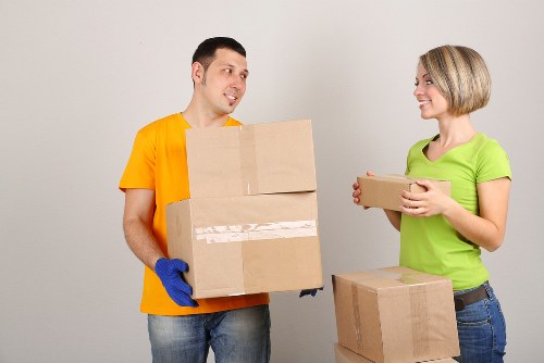 Packed boxes and moving van for Finchley removals